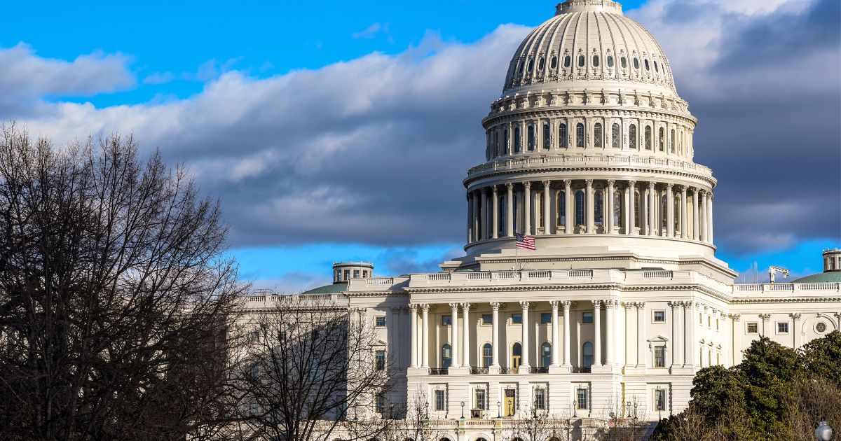 Picture of Capitol Hill under a clear sky, symbolizing the legislative focus on HR 6938 and its impact on state medical marijuana programs.