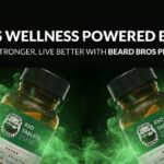 Promotional image for Beard Bros Pharms RSO Tablets, featuring two amber glass bottles with green labels against a dark background with glowing green smoky effects. The labels display 'RSO TABLETS 25MG,' '40 Tablets | 1000mg Total,' and the Beard Bros logo with two bearded figures. The top text reads 'MEN'S WELLNESS POWERED BY RSO' and 'LIVE STRONGER. LIVE BETTER WITH BEARD BROS PHARMS