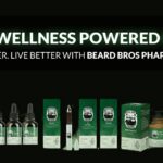 Promotional image for Beard Bros Pharms showcasing their RSO-powered men's wellness products. The top section features glowing green text reading 'MEN'S WELLNESS POWERED BY RSO' and a white tagline, 'LIVE STRONGER. LIVE BETTER WITH BEARD BROS PHARMS.' The bottom section displays a variety of products, including dark glass dropper bottles labeled 'CBD RSO Full Spectrum Cannabis Oil,' green boxes labeled 'THC RSO Full Spectrum Cannabis Oil,' and a bottle of 'RSO Tablets 25MG.' The products are set against a dark background with vibrant green highlights.