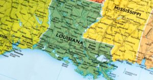 Detailed map highlighting Louisiana and surrounding states, including cities, highways, rivers, and the Gulf Coast. The map visually represents the region's infrastructure and geography, relevant to discussions about Louisiana's Adult-Use cannabis pilot program.