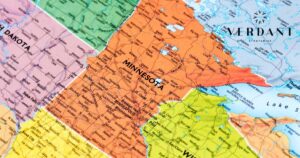 Map of the upper Midwest, highlighting Minnesota in orange, surrounded by North Dakota, South Dakota, Wisconsin, and Iowa. The map shows major cities, highways, rivers, and lakes like Lake Superior. Overlaid in the top right is the 'Verdant Strategies' logo, suggesting a focus on regional cannabis startups. Keywords: Minnesota cannabis startups