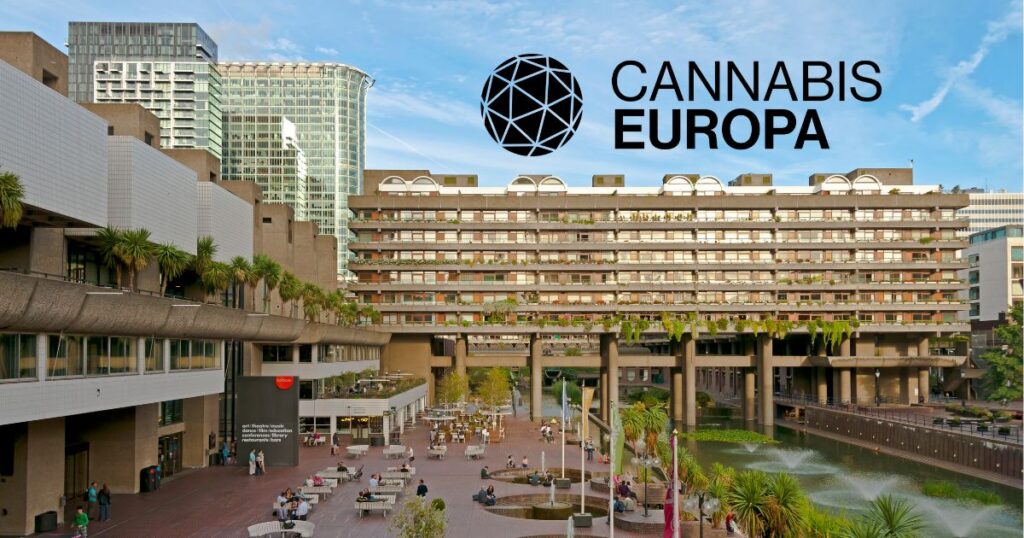 Promotional image for Cannabis Europa cannabis conference featuring the iconic Barbican Centre in London with its brutalist architecture, lush greenery, and a bustling plaza. Overlaid text reads 'CANNABIS EUROPA' alongside a geometric sphere logo, set against a clear blue sky