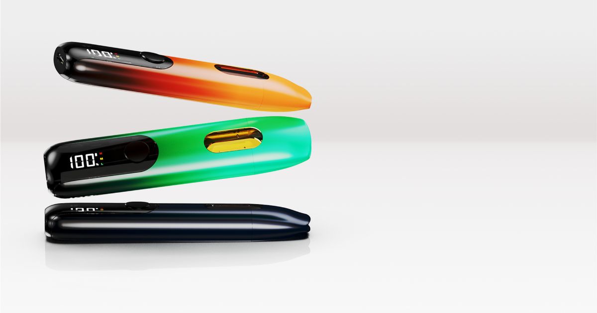 Minimalist product showcase of three sleek cannabis vape devices, the Greentank GT 20 Max, featuring vibrant color gradients (red-orange, green, and navy blue) and digital displays showing '100%.' The design highlights modern technology with transparent liquid windows and 'H, M, L' power settings, set against a clean white background