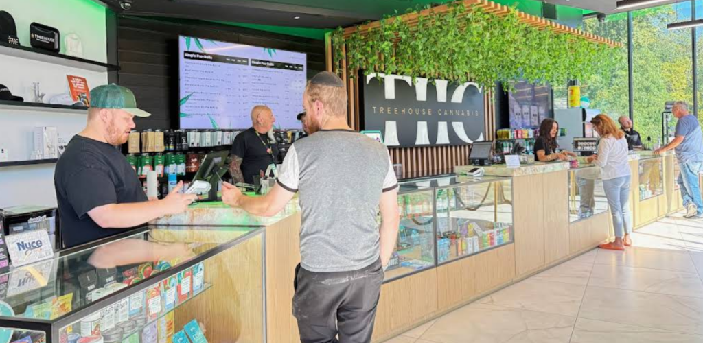 An image of Treehouse dispensary with customer in it.